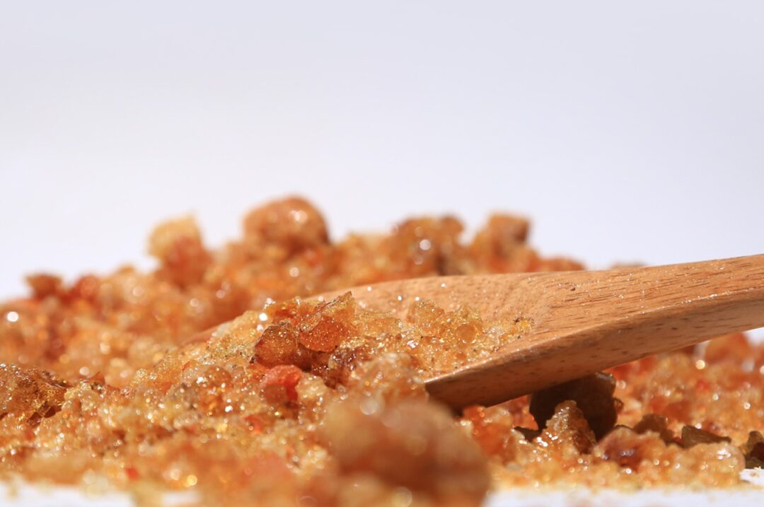 Raw Acacia seyal gum on a spoon
